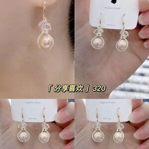 Pearl gold & silver plated earrings